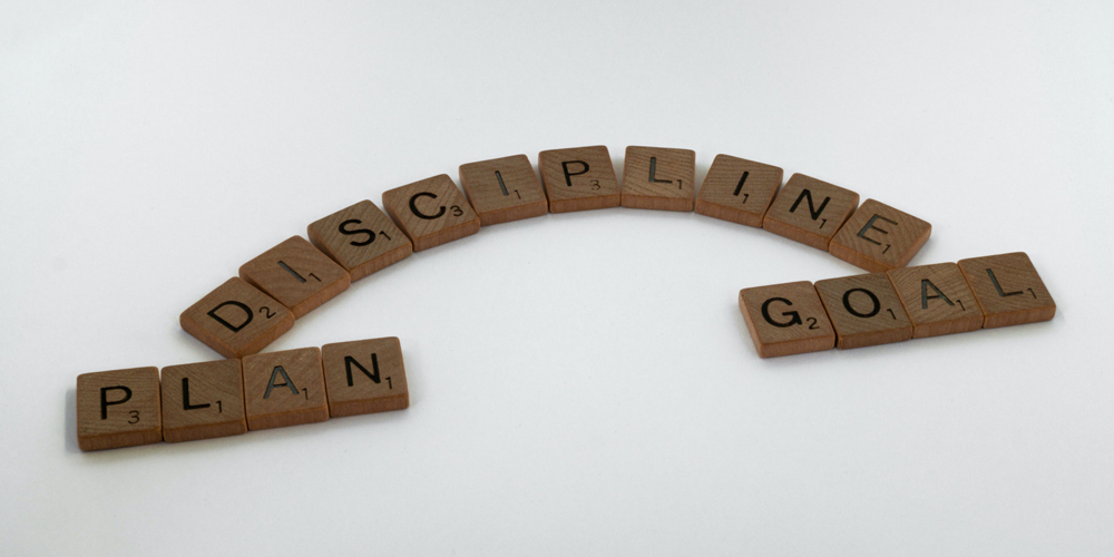Scrabble tiles spelling discipline
